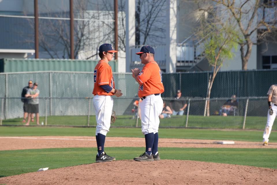 COS Manager Jody Allen talking to Alex Garcia on the mound.