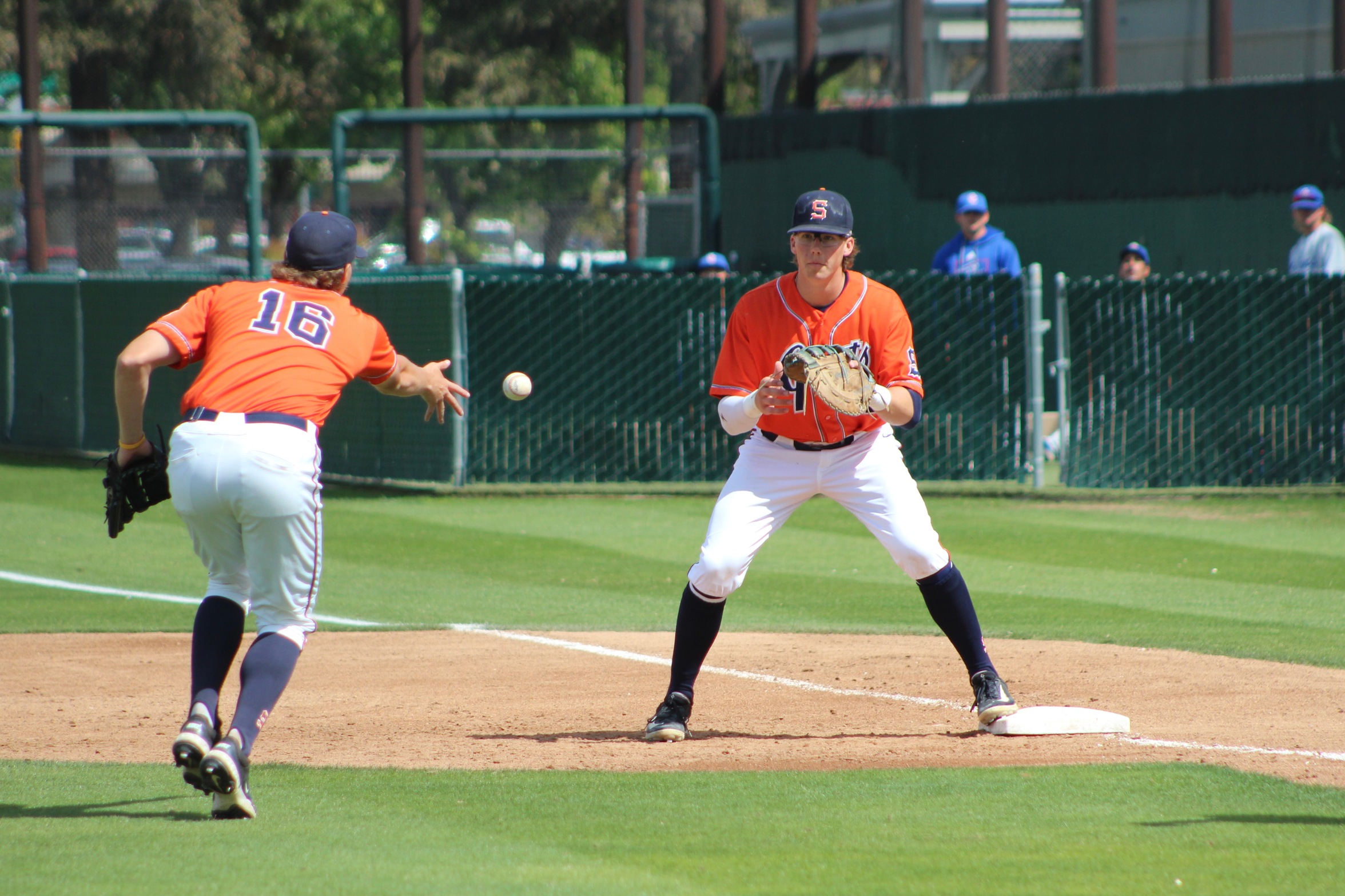 College of the Sequoias' Hudson Groh (16) makes a toss to Ned Ceklic (41) in a game versus Coalinga College on April 3, 2025.