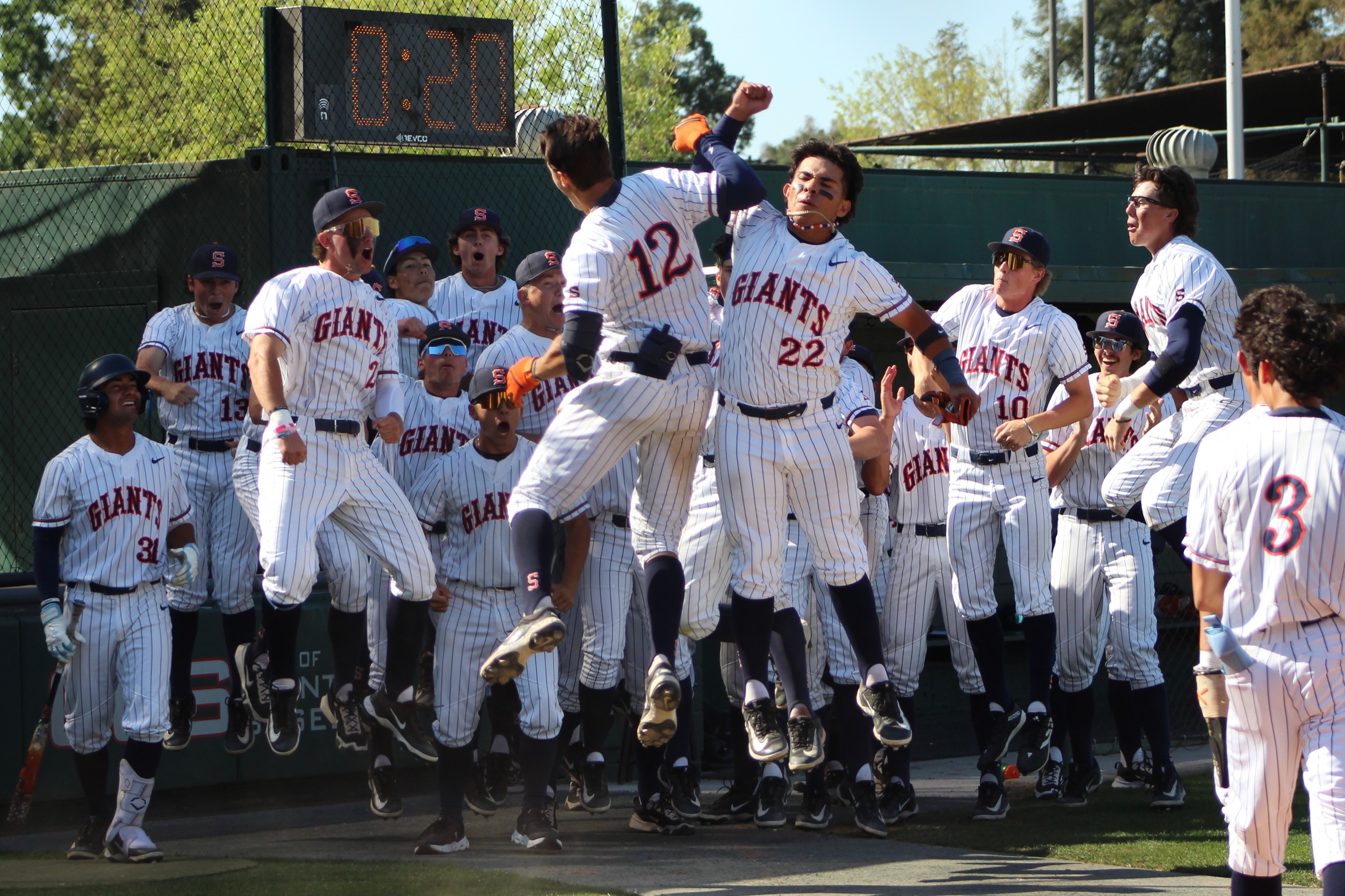 College of the Sequoias' Walker Selley (12) and Diego Sanchez (22) celebrating with teammates after Selley's 2-run homerun put COS ahead 3-2 in the bottom of the 8th versus Fresno City College on April 8, 2025. (Photo Credit: Cydnee Allen)