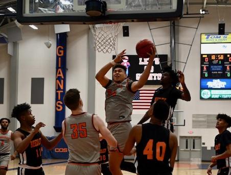 Giants rout Reedley, clinch share of first CVC men's basketball title since 2001