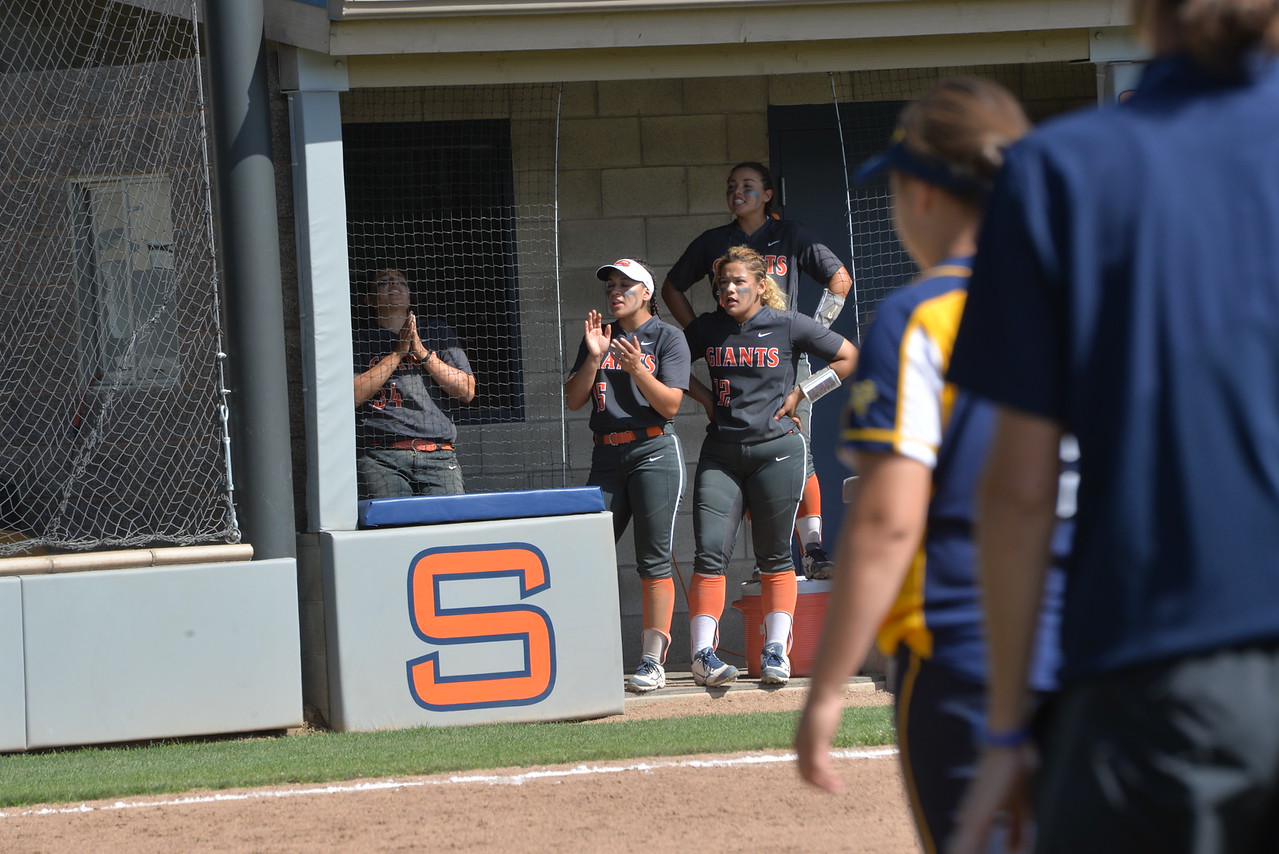 Ana Hayes and Liz Valdez cheer on their teammates during a contest earlier in the season.