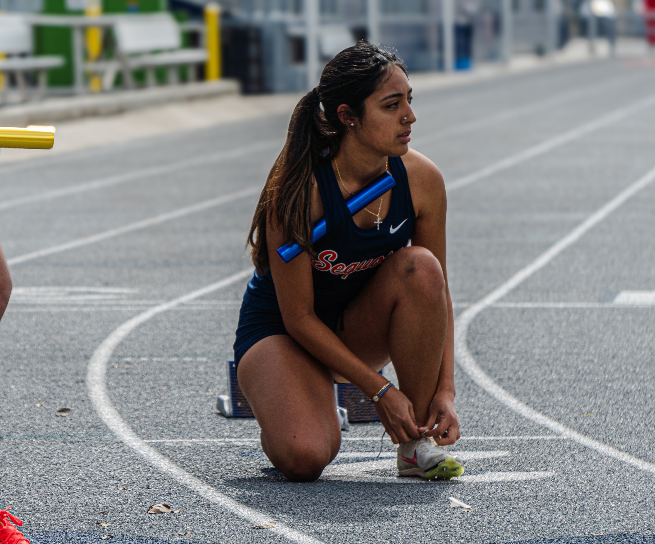 College of the Sequoias' Lilianna Ramirez-Romero before running the Women's 4x100 relay.