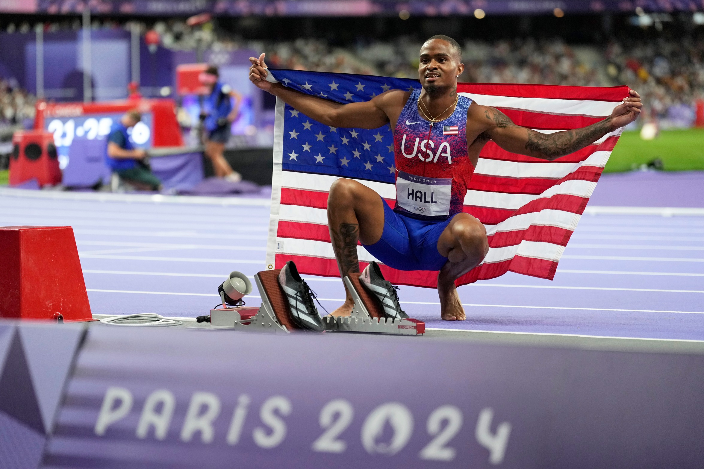 Quincy Hall, former COS Track standout, after winning gold in the men's 400-meter final at the 2024 Summer Olympics, Wednesday, Aug. 7, 2024. (AP Photo)