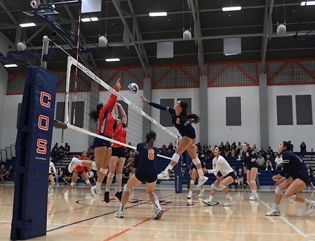 Gahagen spikes the ball vs. West Hill Coalinga on 10/14/22 (Photo by Norma Foster)
