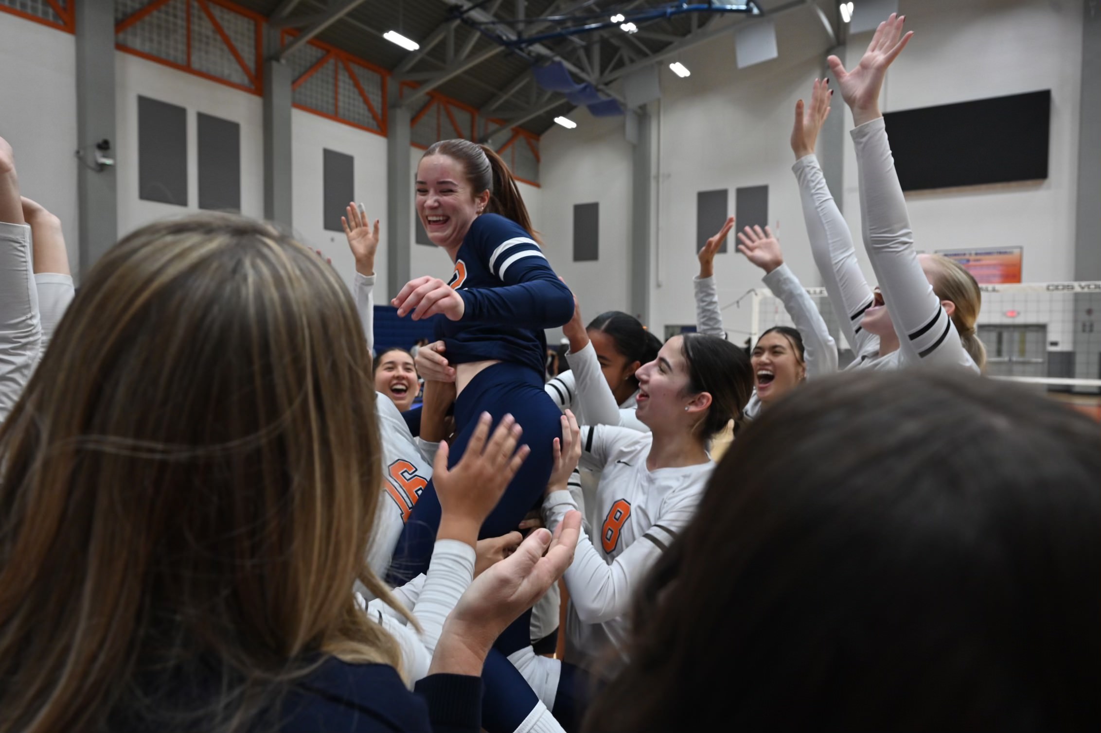 College of the Sequoias' Allison Wood (2) celebrating with her team after her 500th dig of the season. (Photo Credit: Norma Foster / COS Athletics)